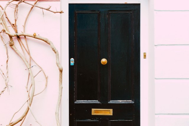 The black front door of a house