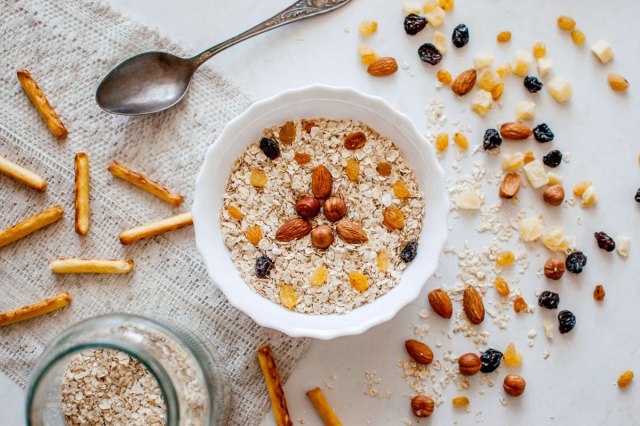 An image of nuts and bowl of cereal