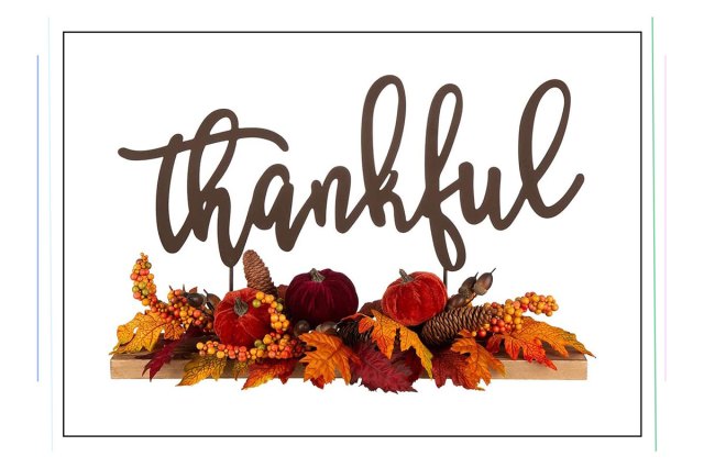 An image of an autumnal centerpiece with the word "Thankful"